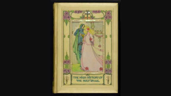 An illustrated book cover by Jessie M King entitled "The High History of the Holy Graal". It shows a woman in a gown and an armoured knight.