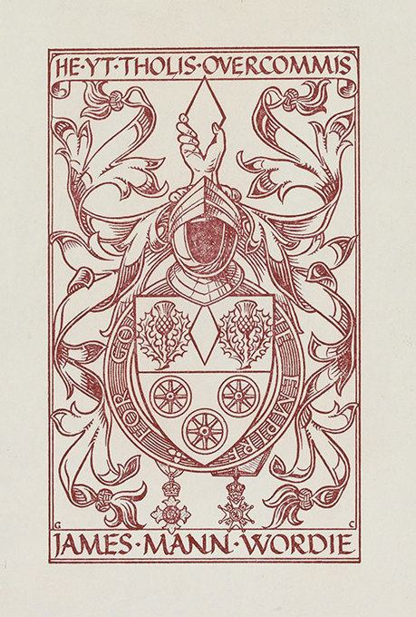Red decorative bookplate featuring a heraldic shield with symbols, surrounded by ornate leaves and scrollwork.