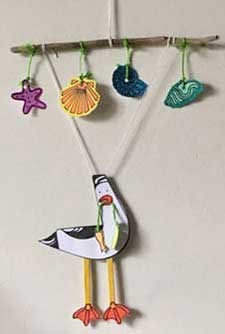 Seagull mobile on wall