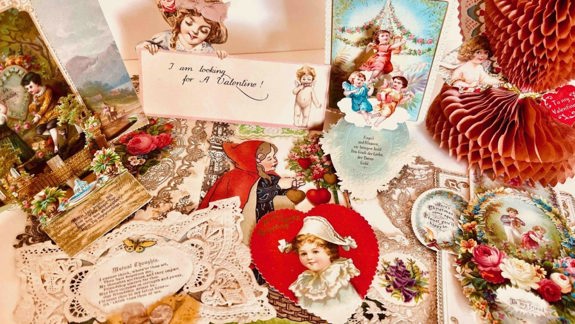 A collection of Valentines-related cards featuring cherubs and hearts.