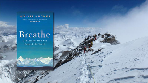 Book cover of Mollie Hughe's book 'Breathe' over top of a photo of people climbing the ridge of a mountain.